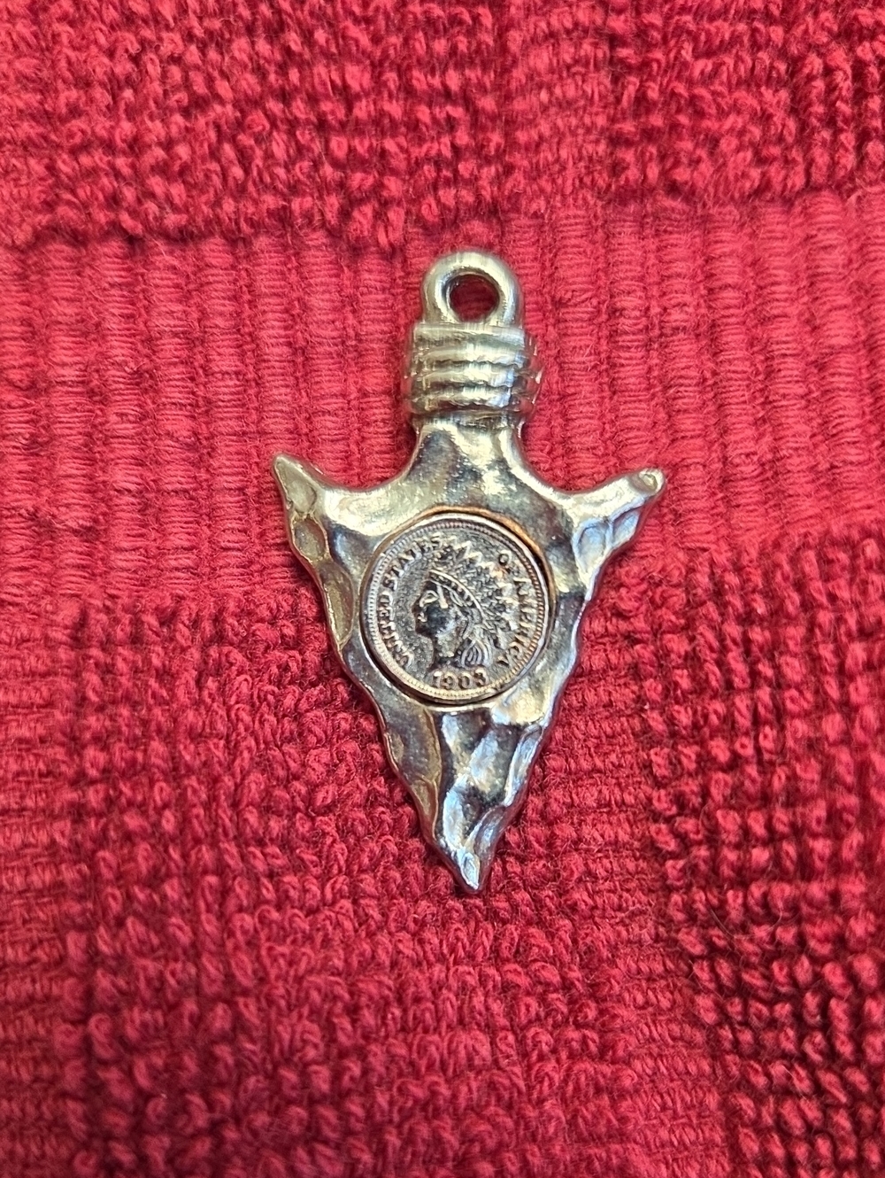Silver-toned Arrowhead Pendant With Embedded Coin Design